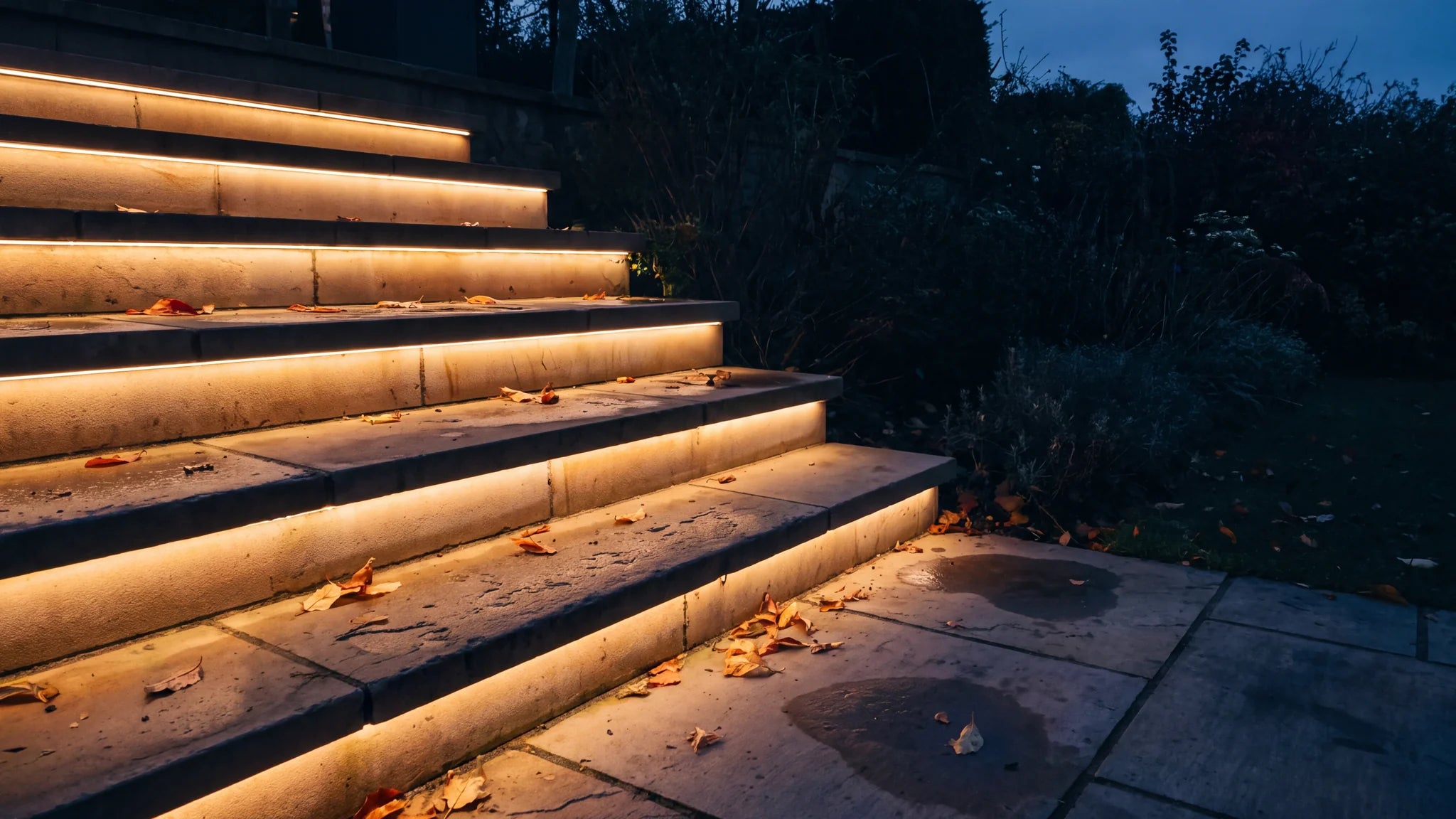 Warm white LED lighting around landscaped garden steps