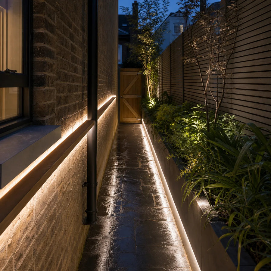Garden LED lighting in side passage with planting