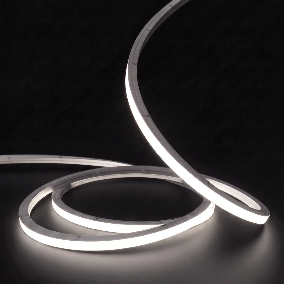Neutral White 4000K LED Neon Flex 15x15mm Top Bend, low concentric coils with raised arc and colour glow on a black surface