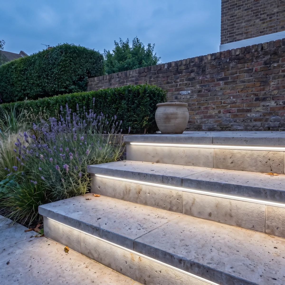 Neutral White 4000K 15x15mm Top Bend LED neon flex - outdoor garden-step installation illustration.