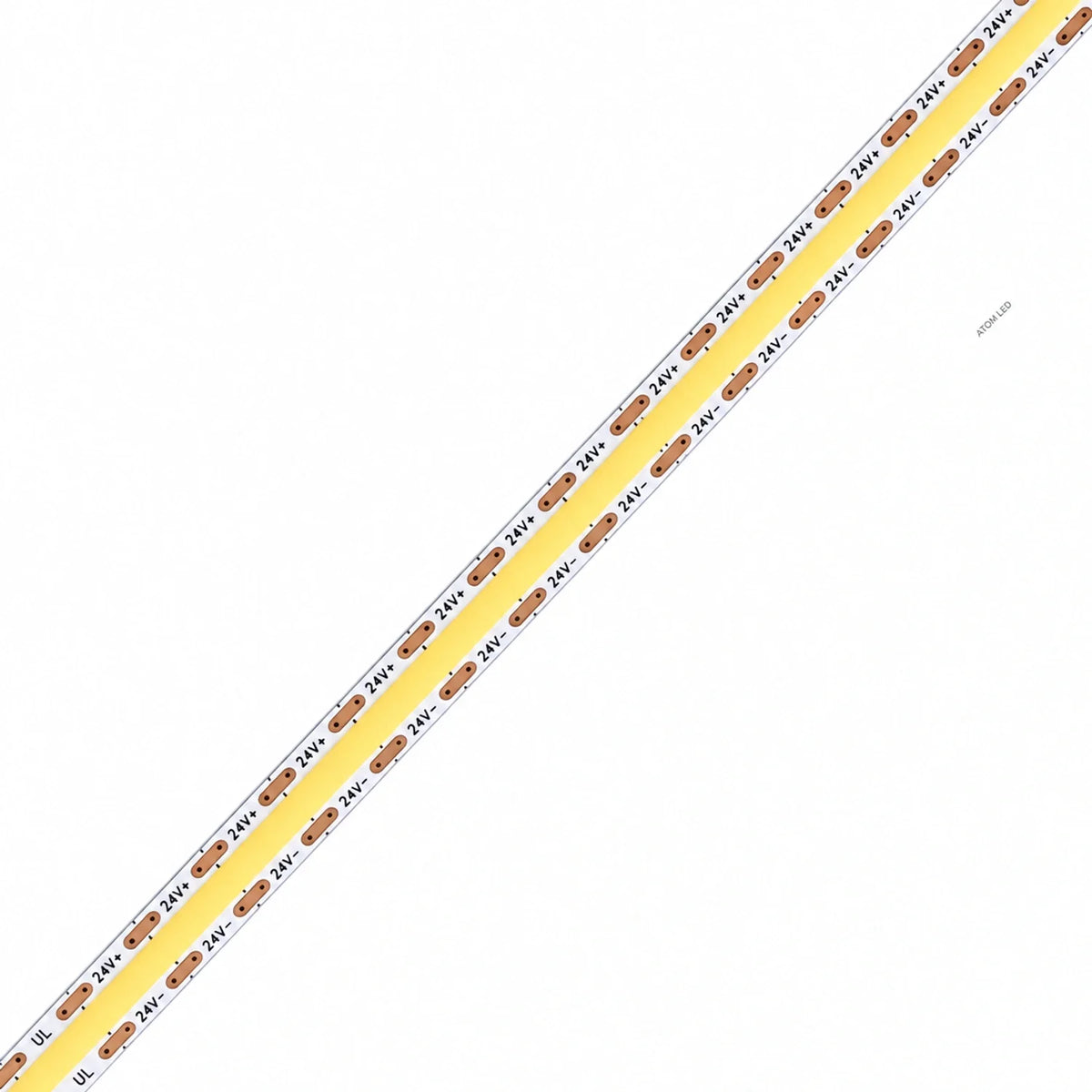 24V 10mm COB LED strip close-up with white PCB, copper contacts and yellow phosphor for the 8.33mm cut-point 15m-run range