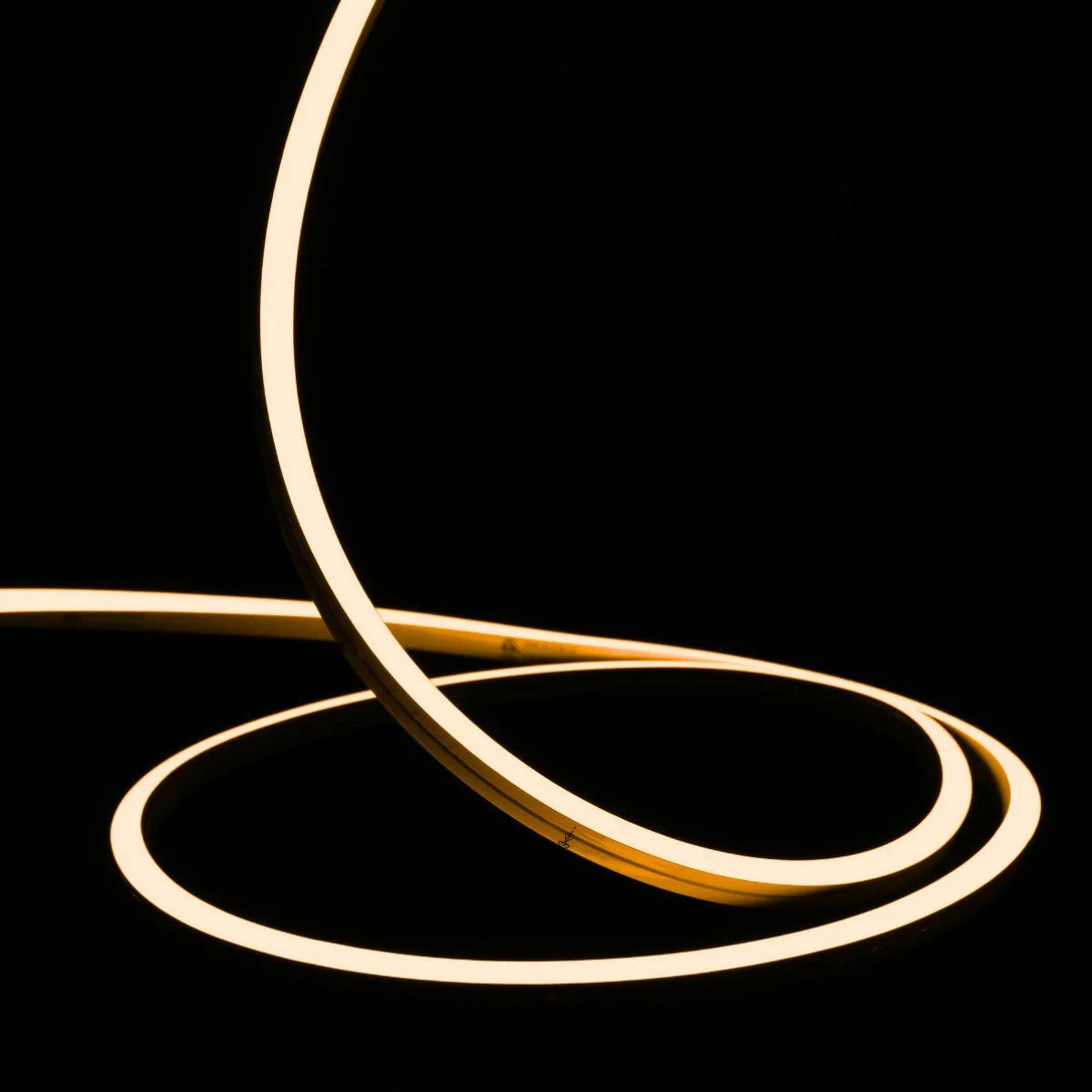 ATOM LED warm white 2700K 10x10mm side bend neon flex lighting a driveway edge in one continuous run — 48V IP67 waterproof