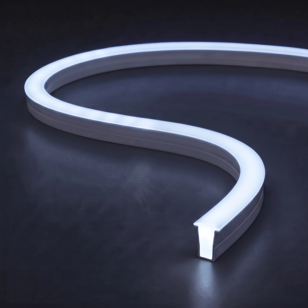 RGB neon flex showing an icy cool white RGB mix with a blue tint and matching glow on a dark charcoal surface