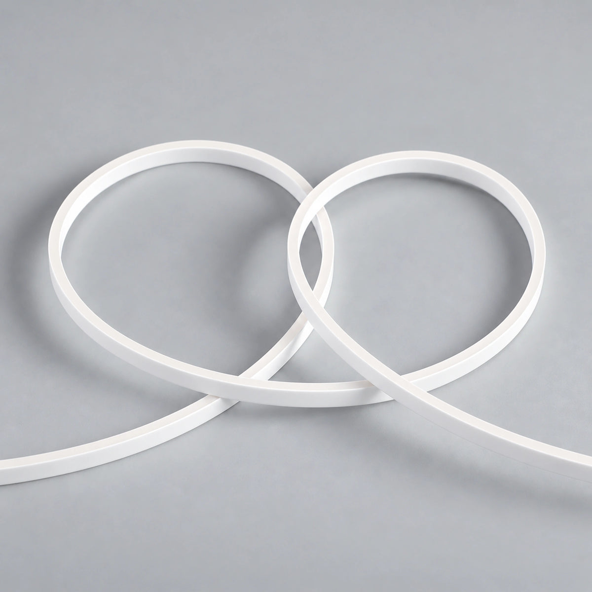 House of LEDs — FreeCut mini neon flex 4x8mm unlit white silicone LED strip showing flexible loops