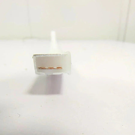 Unlit neon flex end-face showing the solid silicone housing