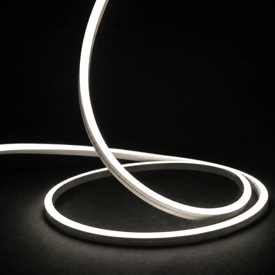 4000K side-bend Neon Flex raised in loops on a dark surface, colour-adjusted product photograph
