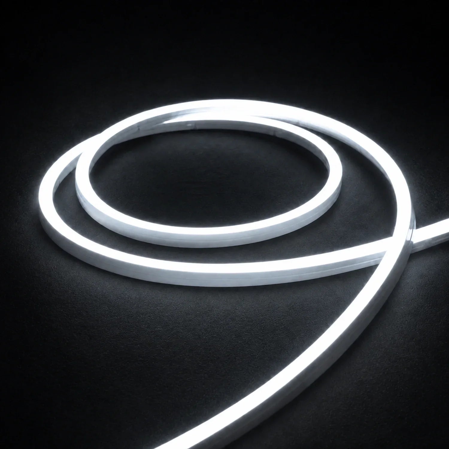 6000K side-bend Neon Flex coiled on a dark surface, colour-adjusted product photograph
