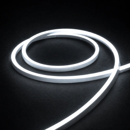 6000K side-bend Neon Flex coiled on a dark surface, colour-adjusted product photograph