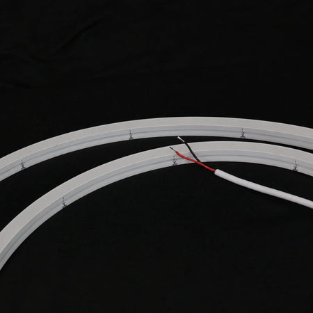 Unlit 15×15mm side-bend Neon Flex showing cut marks and two-wire lead
