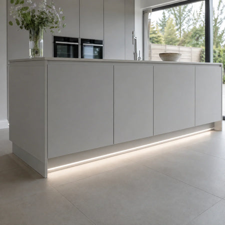 4000K 10×6mm Neon Flex lighting a kitchen plinth and kickboard, installation illustration