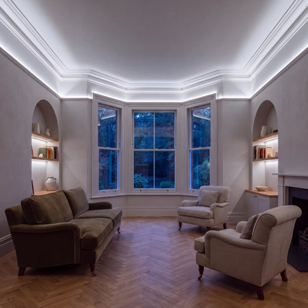 Cool White 6500K COB LED strip ceiling coving lighting in a large British living room in the evening; installation illustration.