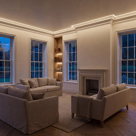 Warm White 2700K COB LED strip ceiling coving lighting in a large British living room in the evening; installation illustration.