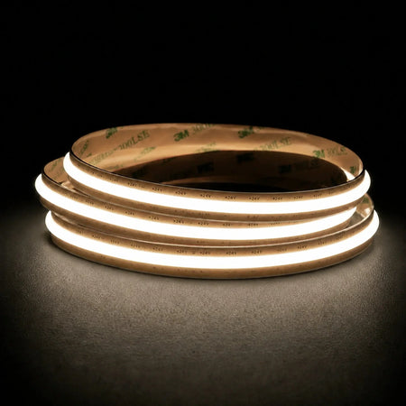 Natural White 4000K Free Cut COB LED strip coil illuminated on a dark background, 24V DC and 10mm wide.