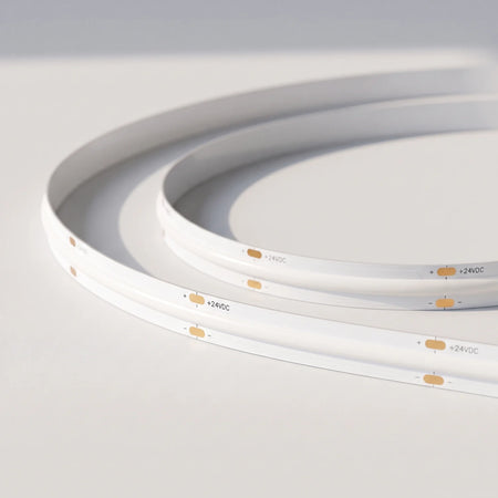 Unlit 10mm SCOB LED strip showing white board and 24V connection pads