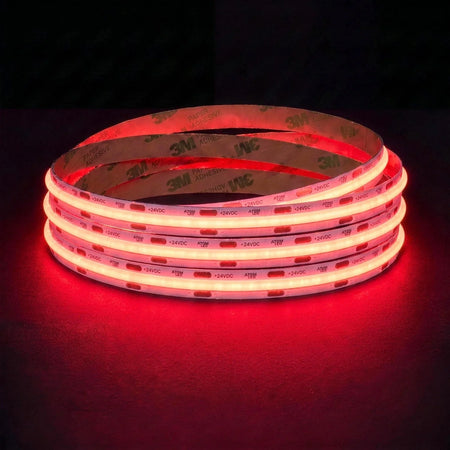 Red SCOB LED strip coil illuminated on a dark background, 24V DC and 10mm wide.